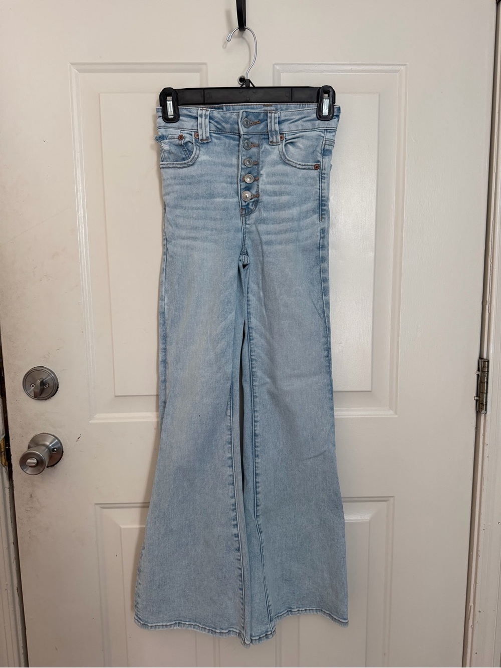 American Eagle Outfitters Light Blue High-Rise Flare Jeans with Button Front